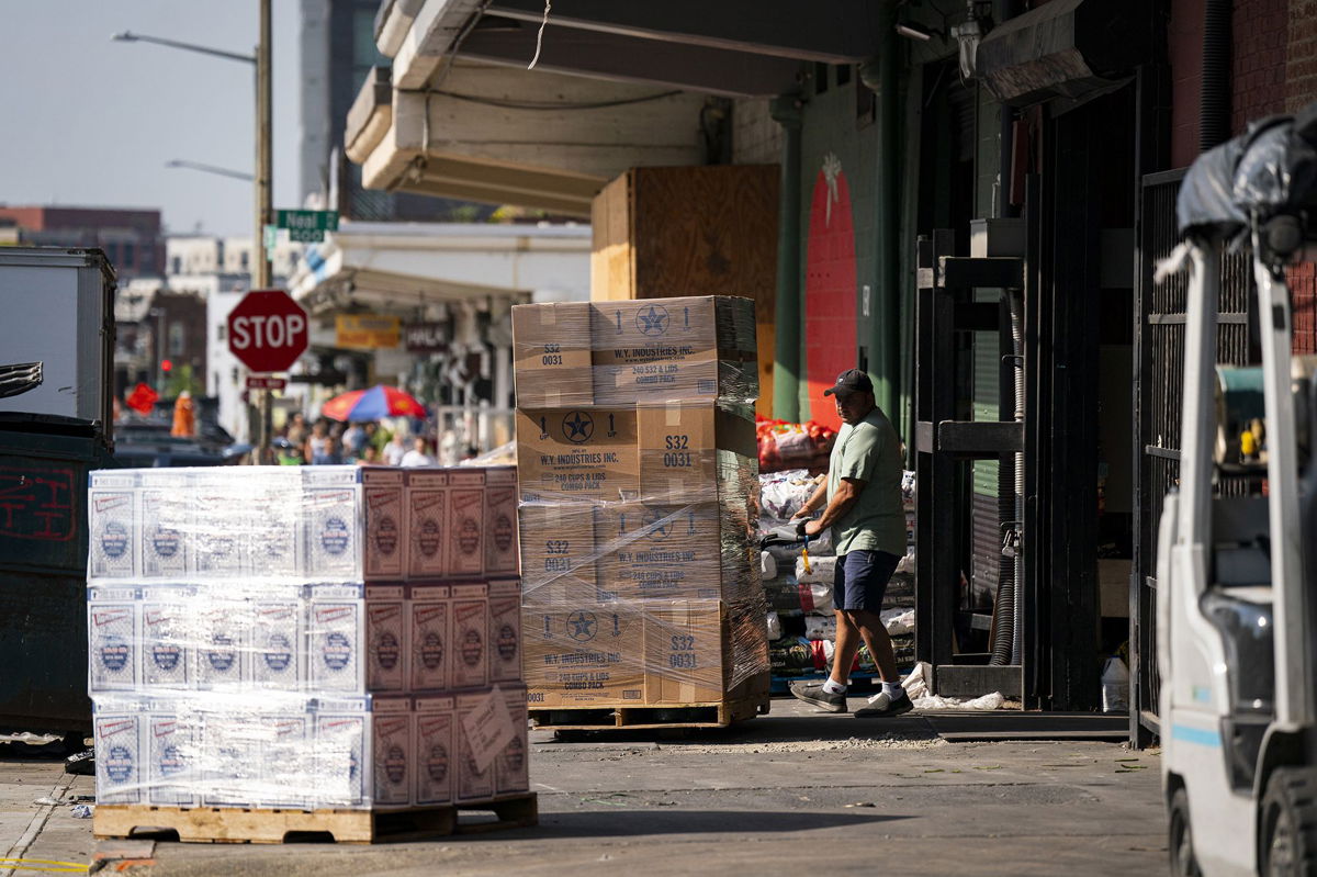 <i>Al Drago/Bloomberg/Getty Images</i><br/>A worker wheels a pallet at a wholesale produce market in the Union Market district in Washington