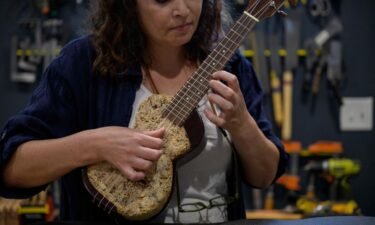 Rachel Rosenkrantz playing a mycelium ukulele .