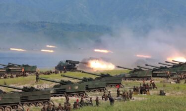 Rockets are launched by Korean People's Army (KPA) personnel during a target strike exercise at an undisclosed location in North Korea.