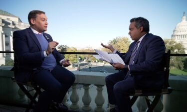 Rep. George Santos speaks to CNN's Manu Raju during an interview near Capitol Hill on Friday