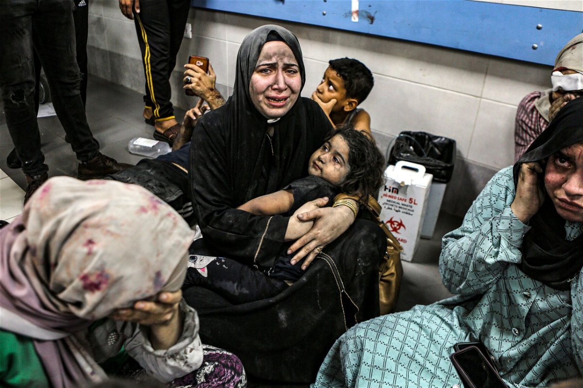<i>Abed Khaled/AP</i><br/>Wounded Palestinians sit in al-Shifa hospital in Gaza City