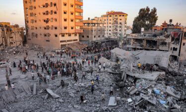 People search rubble for survivors and the bodies of victims in the aftermath of Israeli bombardment in Rafah in the southern Gaza Strip on November 6