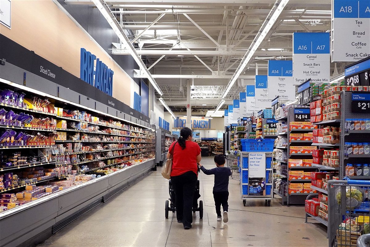 <i>Scott Olson/Getty Images</i><br/>Customers shop at a Walmart store on May 18