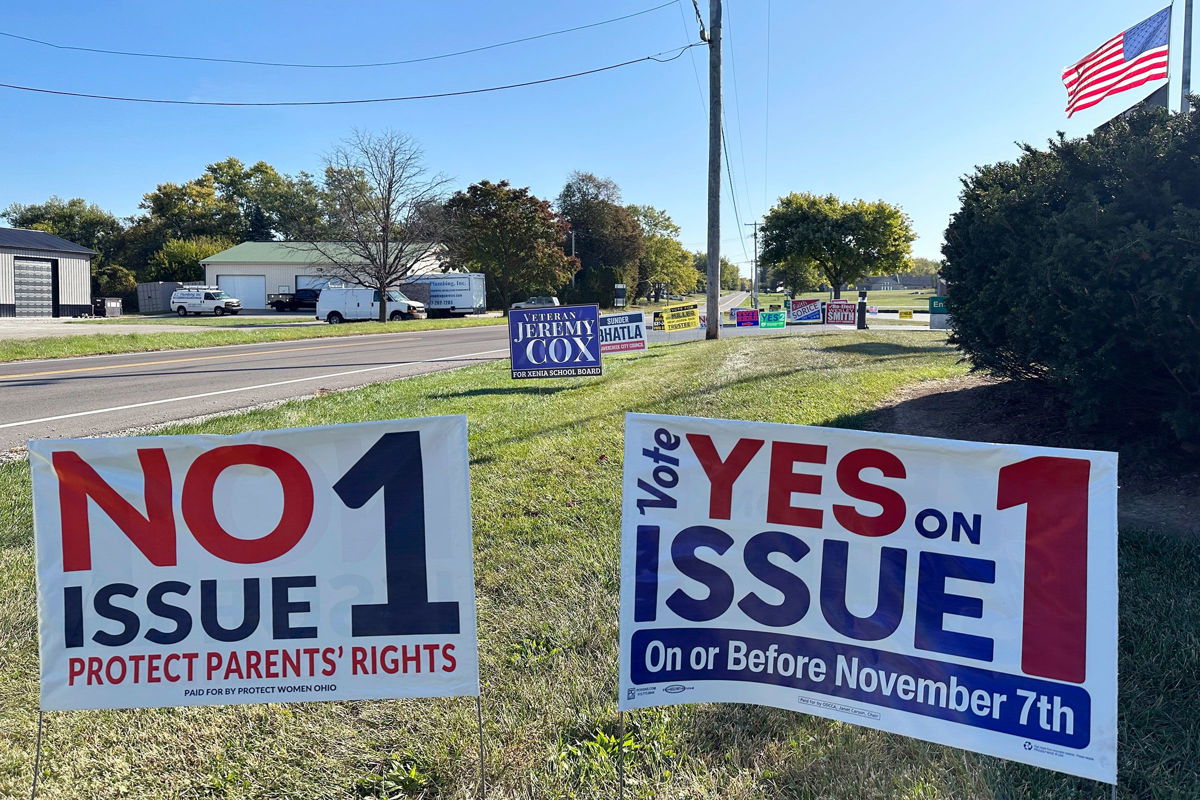 <i>Julie Carr Smyth/AP</i><br/>Signs for and against the Ohio abortion-related ballot measure are seen in front of the Greene County Board of Elections in Xenia on October 11.