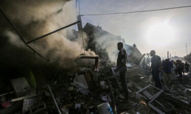 People search through rubble after Israeli airstrikes in Khan Younis