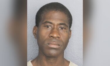 A man has been charged with a hate crime after he allegedly “made his hand into the shape of a firearm and made a shooting gesture” toward a US Postal Service worker near Fort Lauderdale