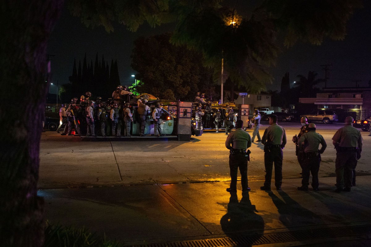 <i>Jason Armond/Los Angeles Times/Getty Images</i><br/>A large number of Sheriffs deputies converged on the area surrounding St. Francis Medical Center where two L.A. County sheriffs deputies are being treated for after being shot and gravely injured in attack