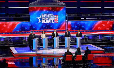 Republican presidential candidates  participate in the third primary debate in Miami on November 8.