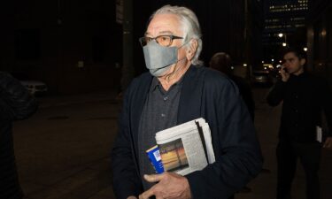 Robert De Niro walks near the Manhattan Federal Courthouse on November 8.