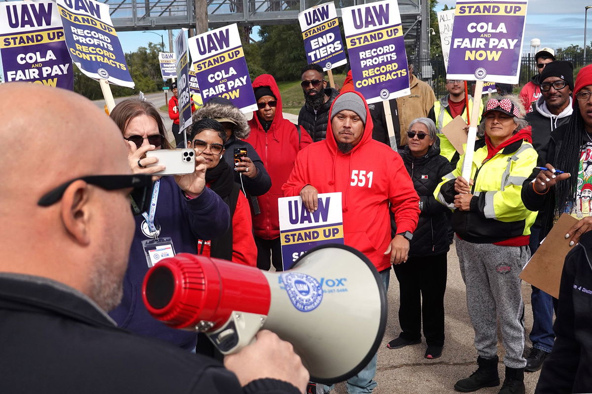 <i>Scott Olson/Getty Images</i><br/>Members of the United Auto Workers union at Ford have ratified their labor deal and by a larger margin of approval than members at General Motors. Pictured are workers picketing outside of the Ford Assembly plant last month during the UAW strike.