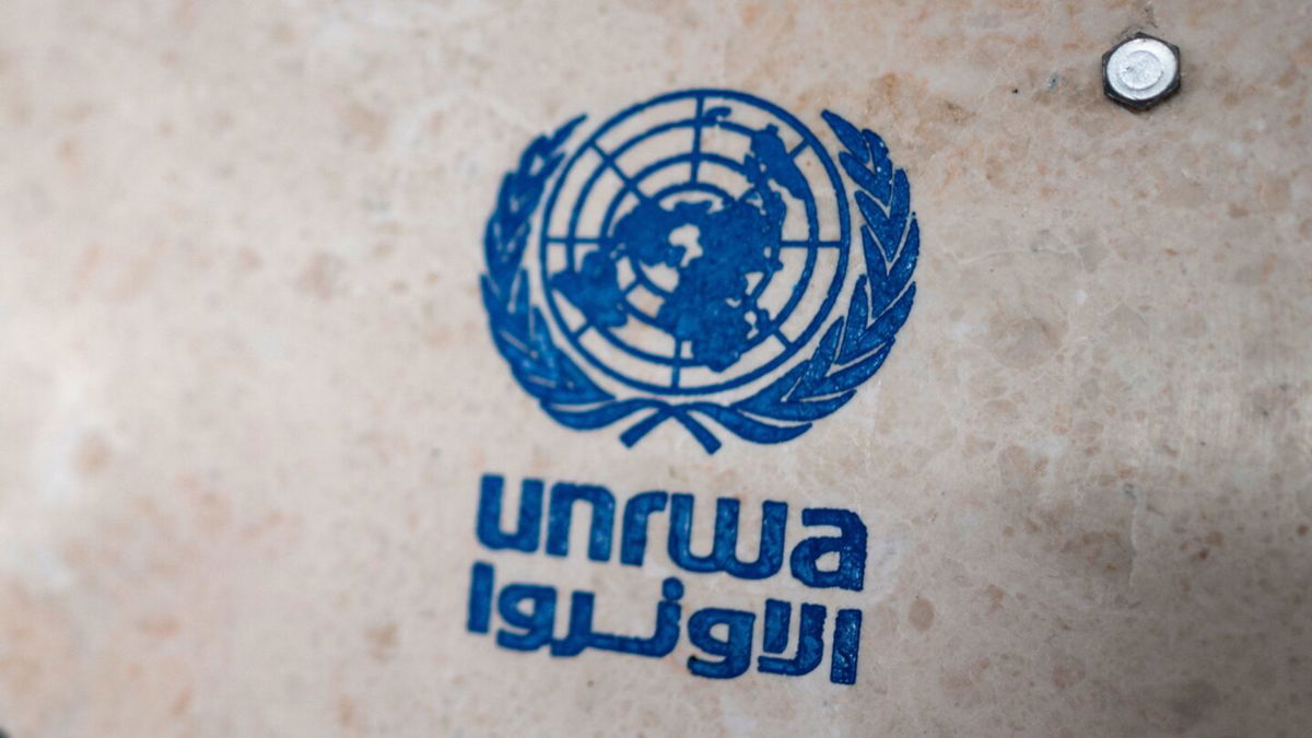<i>Fabian Sommer/picture alliance/Getty Images</i><br/>UNRWA's lettering on a sign at the girls' school in the Talibeh refugee camp run by the United Nations Relief and Works Agency for Palestine Refugees (UNRWA).