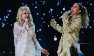 Dolly Parton performs during an event celebrating the Kansas statewide expansion of Dolly Parton's Imagination Library Monday