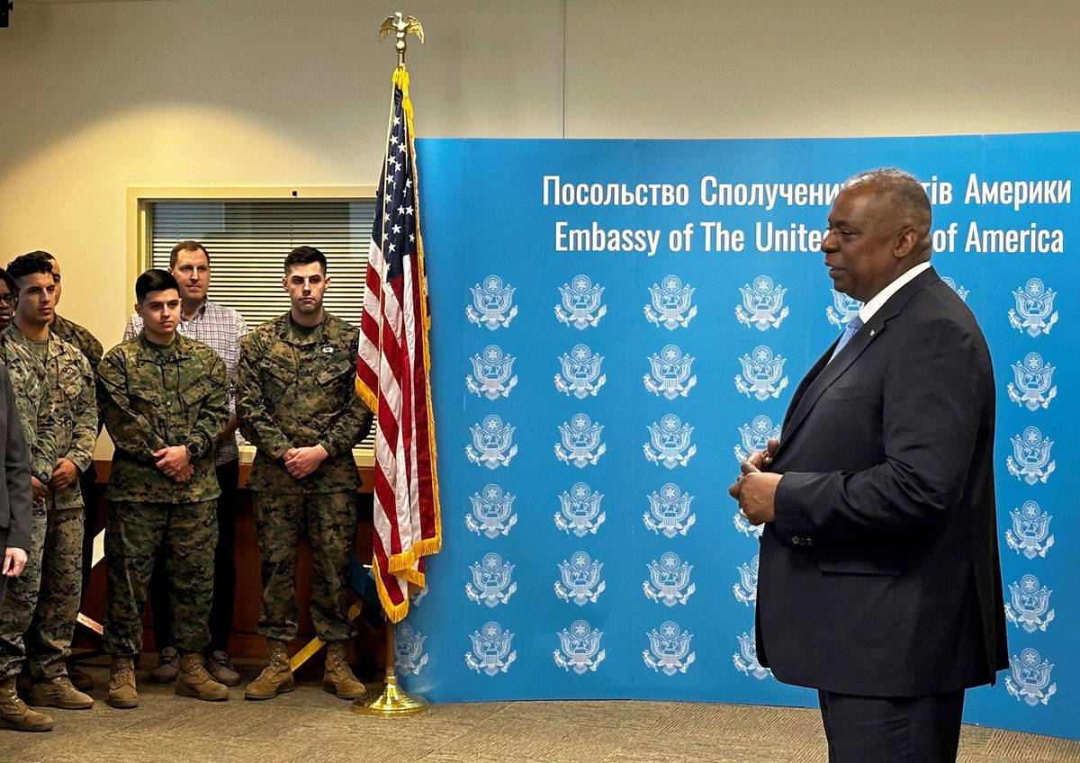 <i>W.G. Dunlop/Pool/AFP/Getty Images</i><br/>United States Secretary of Defense Lloyd Austin (R) speaks to employees of the US embassy in Kyiv during his visit to Ukraine on November 20.