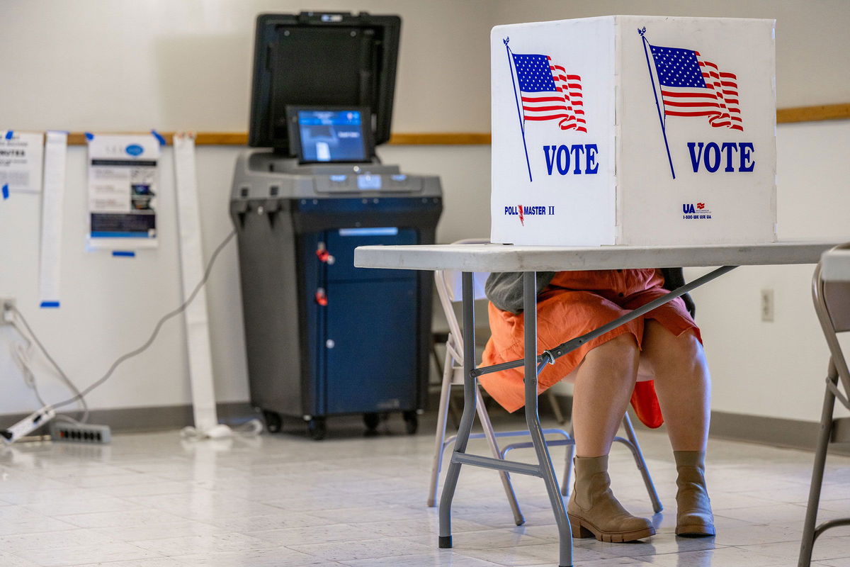 <i>Brandon Bell/Getty Images</i><br/>A voter fills out their ballot in Jackson