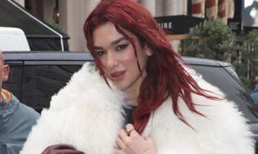 Dua Lipa's new maroon locks are expertly timed with the drop of a new track.