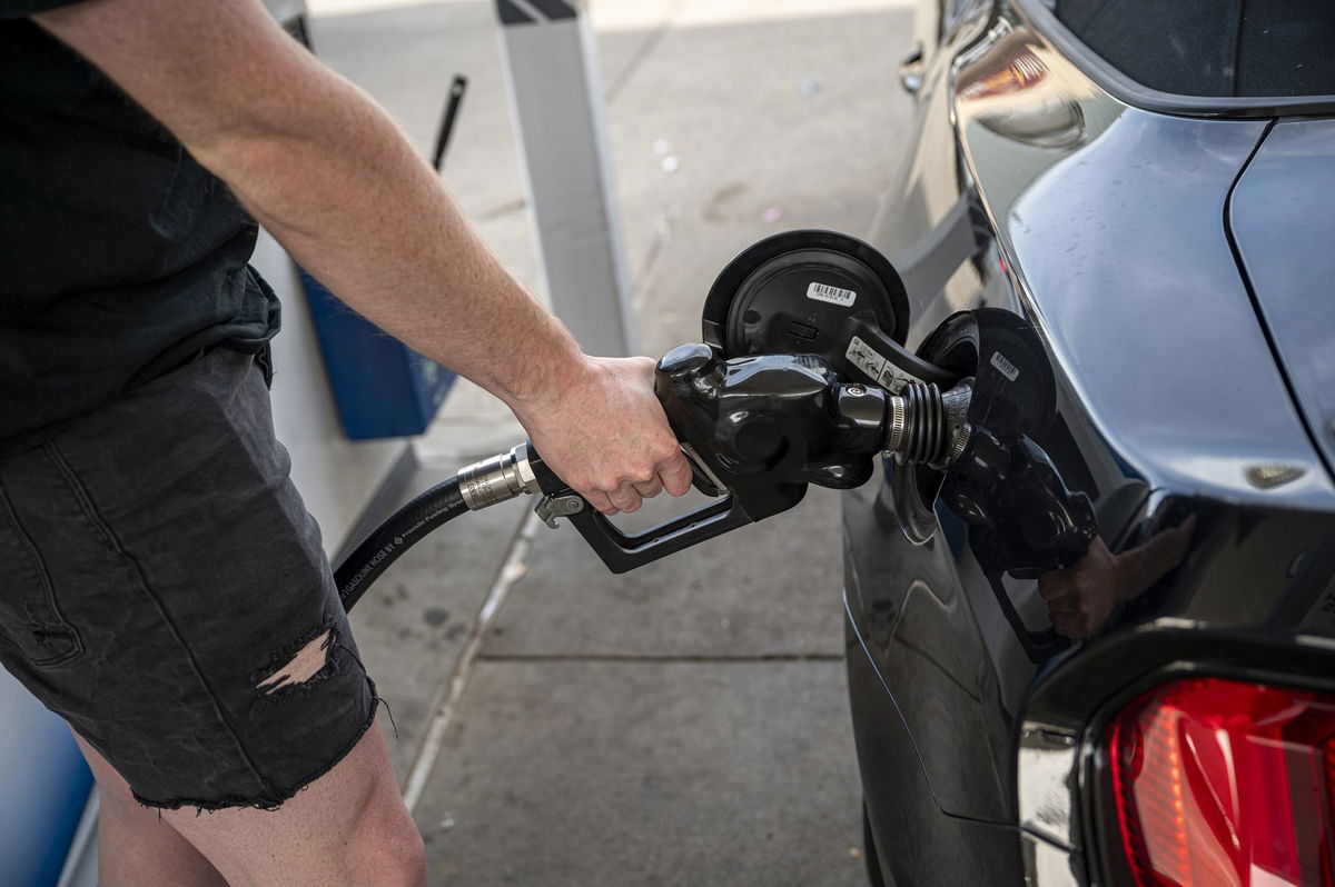 <i>David Paul Morris/Bloomberg/Getty Images</i><br/>Gas prices could fall further. A customer refuels at a Chevron gas station in San Francisco