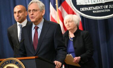 Attorney General Merrick Garland speaks at a press conference with Treasury Secretary Janet Yellen and Commodity Futures Trading Commission Chairman Rostin Behnam to announce cryptocurrency enforcement actions at the Justice Department in Washington