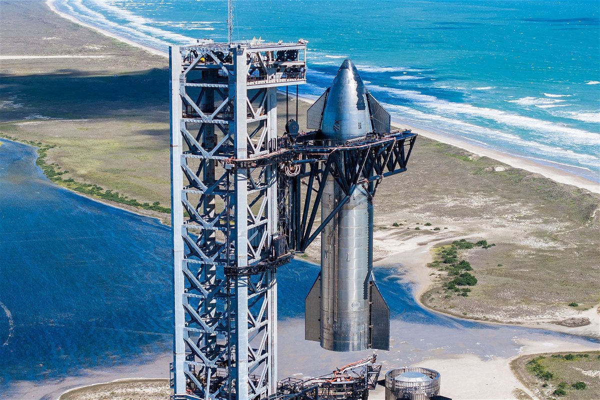 <i>SpaceX/UPI/Shutterstock</i><br/>SpaceX stacks its Starship 25 vehicle prototype atop a Super Heavy booster in mid-October at Starbase in Boca Chica