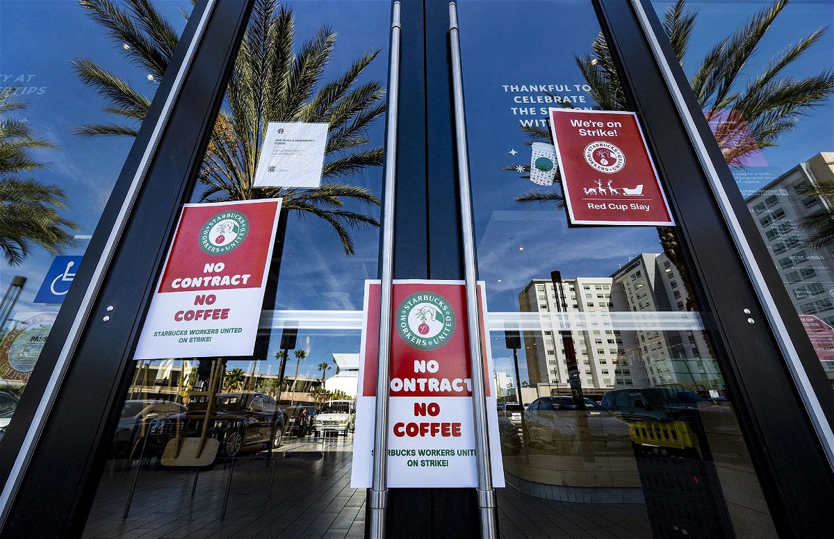 <i>Mark Rightmire/MediaNews Group/Orange County Register/Getty Images</i><br/>Signs are posted on the door of a closed unionized Starbucks Coffee in Anaheim