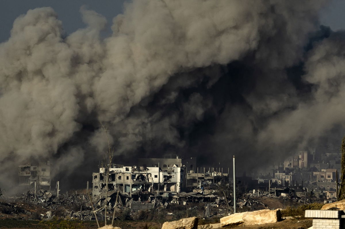 <i>Fadel Senna/AFP/Getty Images</i><br/>Smoke rises during Israeli military bombardment of the northern Gaza Strip on November 15.