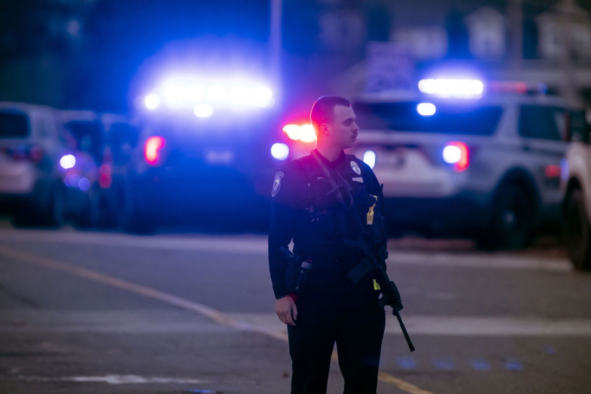 <i>Geoff Forester/The Concord Monitor/AP</i><br/>Police work at the scene of a shooting at New Hampshire Hospital on Friday
