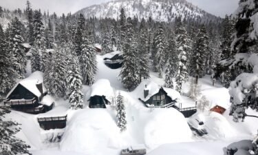 Snow is piled up from new and past storms in the Sierra Nevada mountains