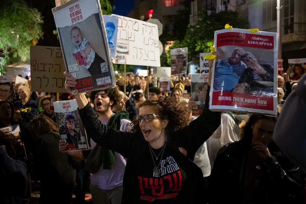 <i>Alexi J. Rosenfeld/Getty Images</i><br/>Parents and relatives of children kidnapped on October 7 hold a demonstration in Tel Aviv.
