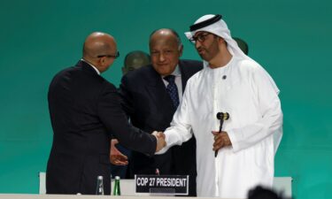 COP28 President Sultan Ahmed Al Jaber holds a gavel next to Egyptian Foreign Minister and COP27 President Sameh Shoukry during the COP28 opening in Dubai on Thursday.