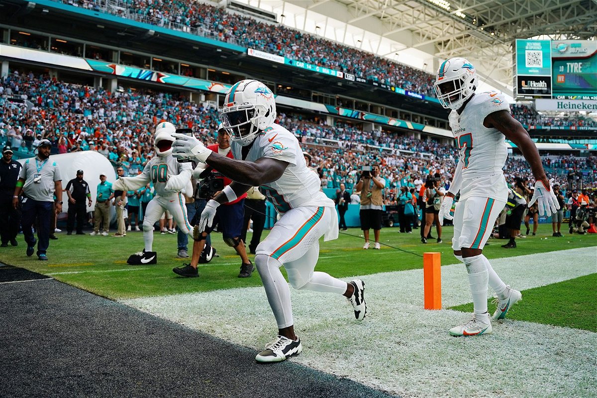 <i>Rich Storry/Getty Images/File</i><br/>Tyreek Hill of the Miami Dolphins celebrates a touchdown during the first half in the game against the Carolina Panthers at Hard Rock Stadium on October 15 in Miami Gardens