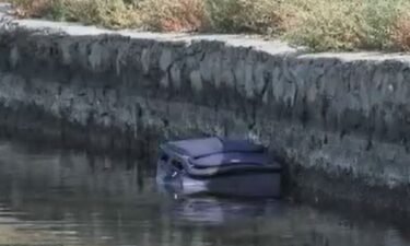 Cleaning crews discovered a large suitcase floating in  Lake Merritt with a human body inside.
