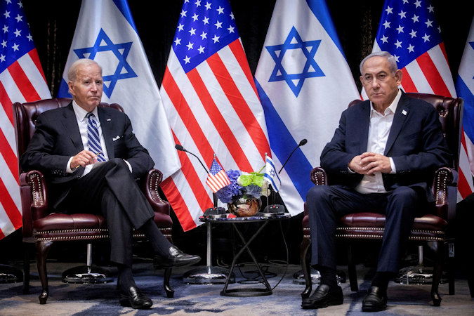 U.S. President Joe Biden, left, pauses during a meeting with Israeli Prime Minister Benjamin Netanyahu, right, to discuss the war between Israel and Hamas, in Tel Aviv, Israel, Wednesday, Oct. 18.