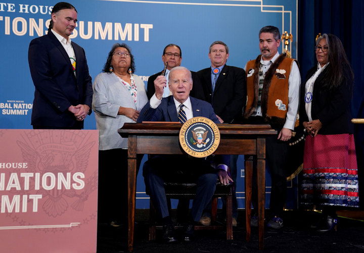 President Joe Biden speaks before signing an executive order at the White House Tribal Nations Summit at the Department of the Interior, Wednesday, Dec. 6, 2023, in Washington.