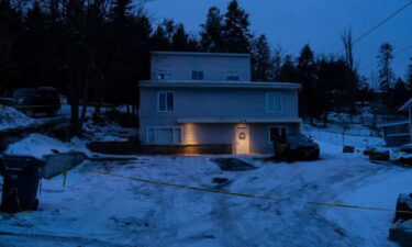 Police tape surrounds the home where four University of Idaho students were killed in November 2022.