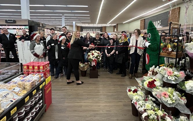 Store workers, officials joined others in Wednesday ribbon-cutting at remodeled S. Hwy. 97 Safeway, formerly Albertsons