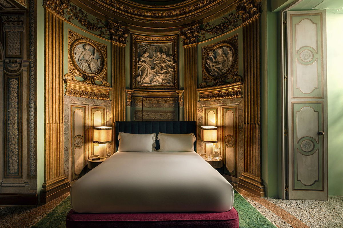 <i>Mattia Aquila/Courtesy Palazzo Vilon</i><br/>The Chapel Suite sits inside a former Baroque chapel and has a frescoed dome ceiling.