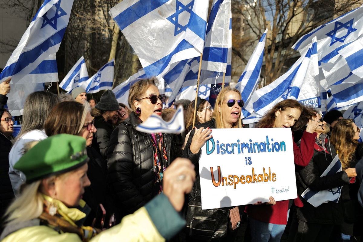 <i>Charly Triballeau/AFP/Getty Images</i><br/>Demonstrators protest outside United Nations headquarters in New York City on December 4.