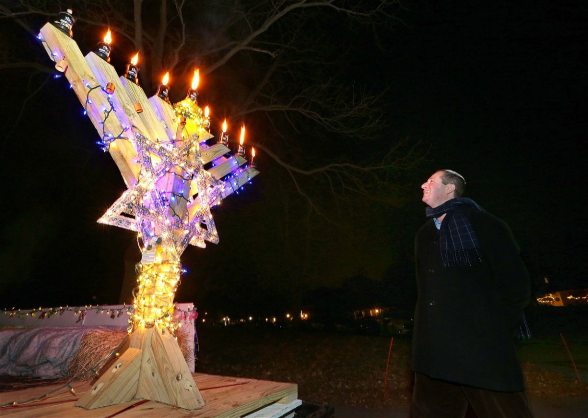 <i>Courtesy Scott Howard</i><br/>Christmas and Hanukkah decorations are seen in Scott Howard's yard outside Chicago.