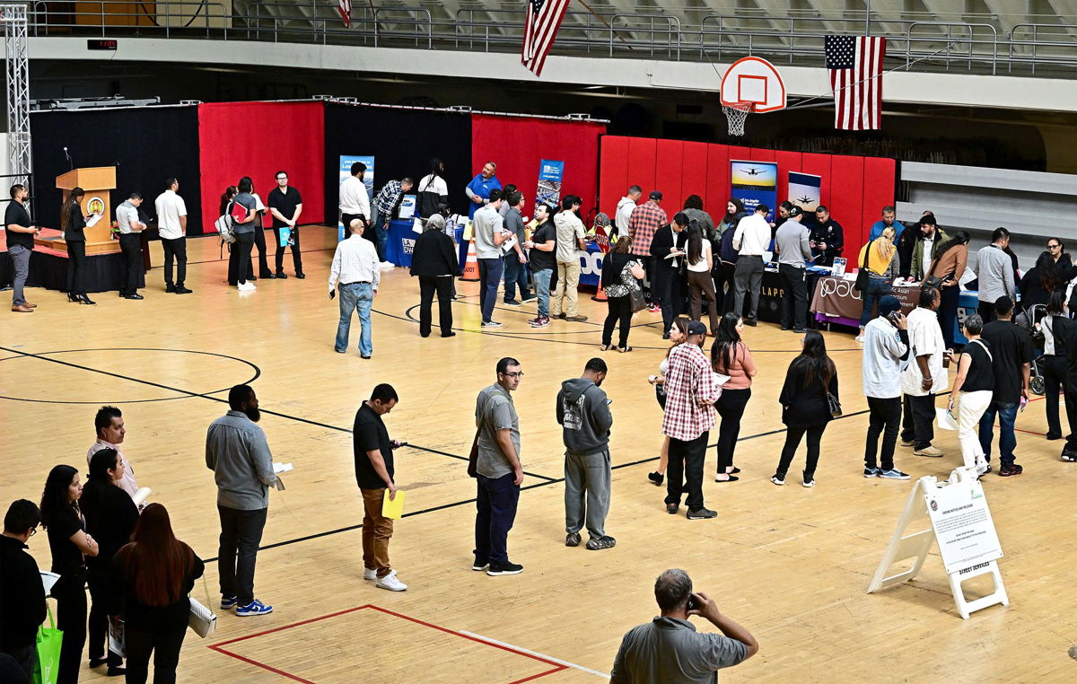 <i>Frederic J. Brown/AFP/Getty Images</i><br/>People wait in line for a chance to speak with prospective employers during a City of Los Angeles career fair offering to fill vacancies in more than 30 classifications of jobs on November 2