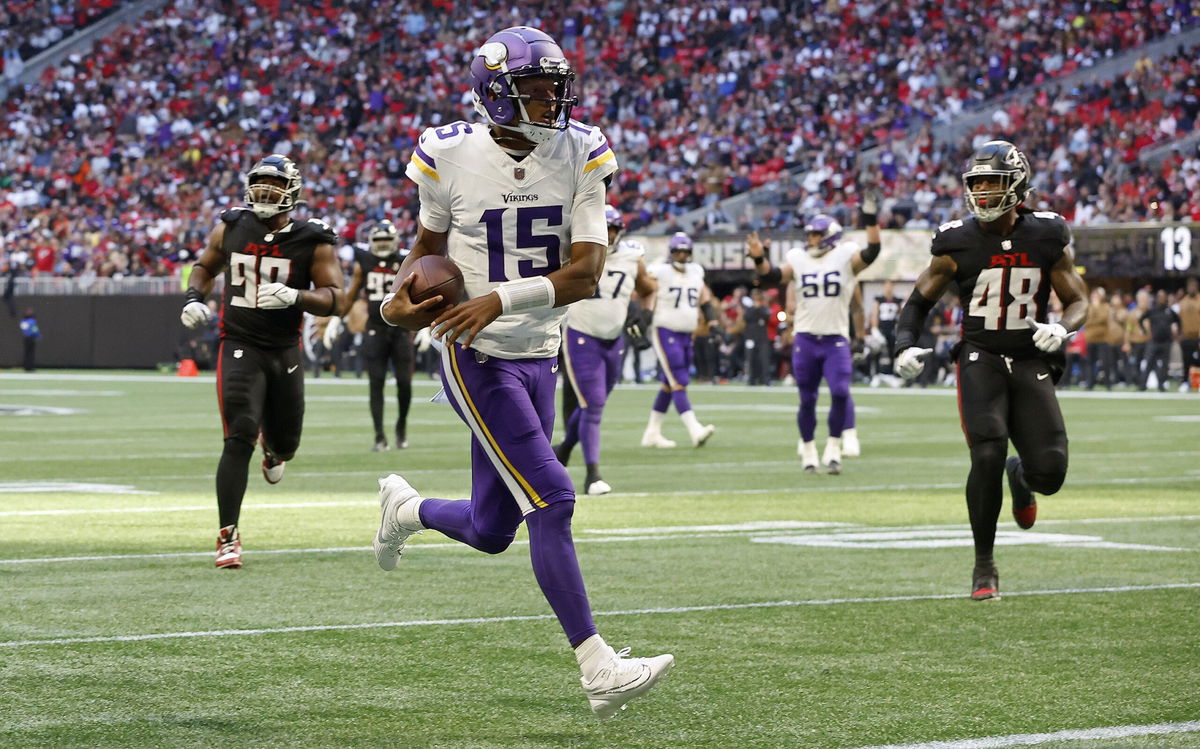 <i>Todd Rosenberg/Getty Images</i><br/>Josh Dobbs warms up prior to the Minnesota Vikings' game against the Chicago Bears at U.S. Bank Stadium on November 27