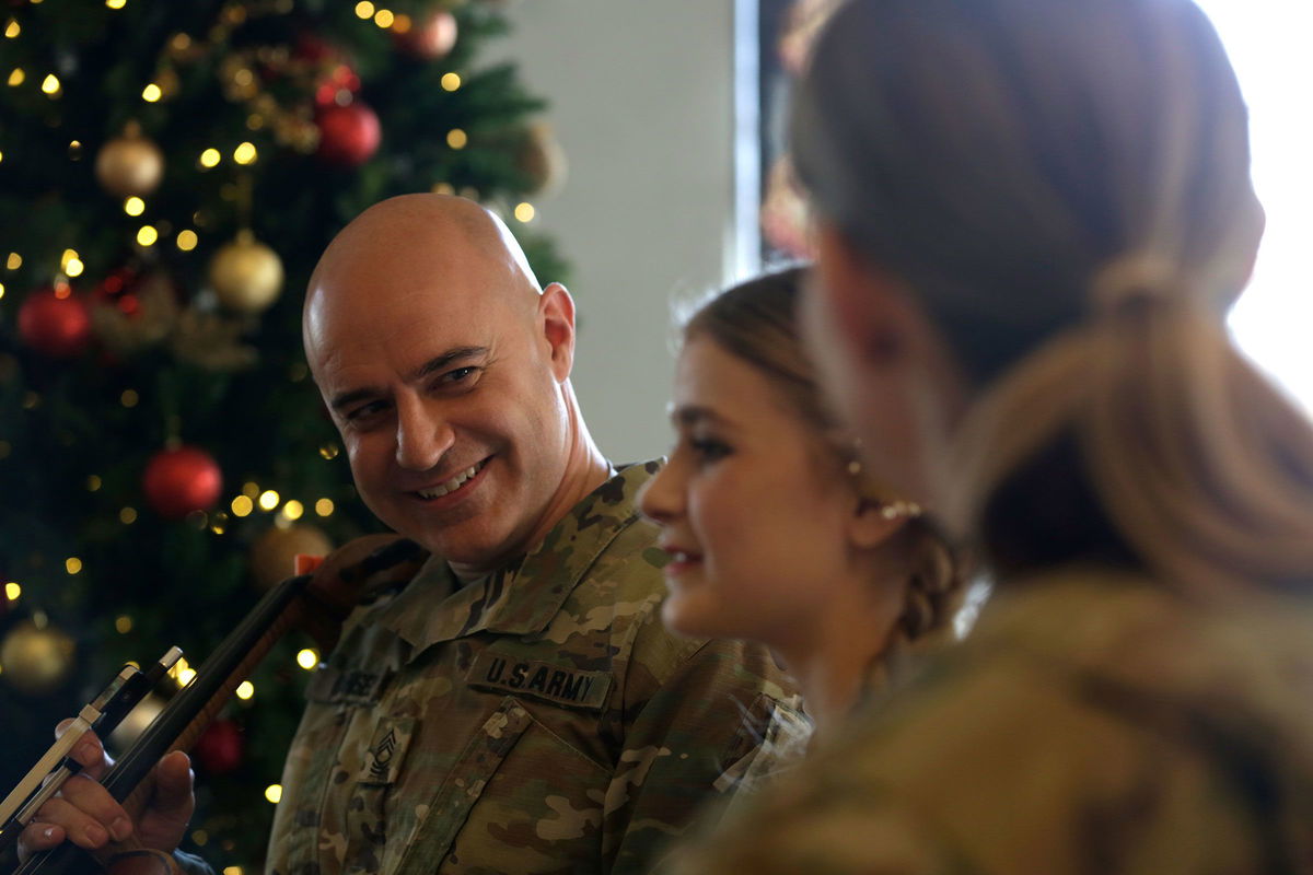 <i>Rebecca Wright/CNN</i><br/>Army Master Sgt. Benjamin Wensel smiles at his daughter