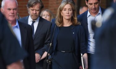 Felicity Huffman leaves court after being sentenced in September 2019.