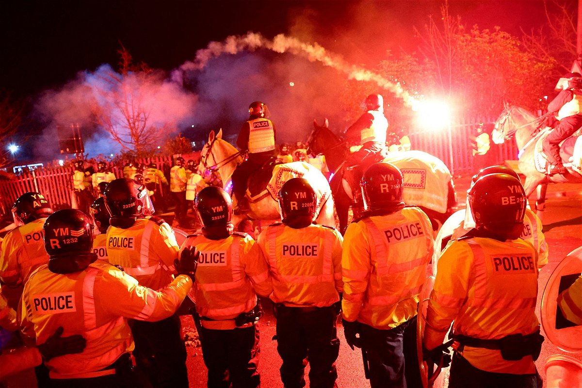 <i>Carl Recine/Reuters</i><br/>Legia Warsaw fans let off flares ahead of their side's Europa Conference League game against Aston Villa.
