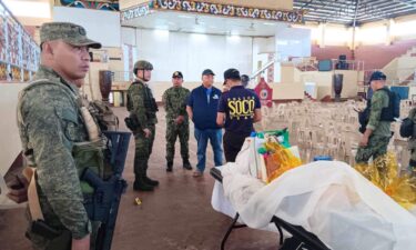 Law enforcement officers at the scene of the explosion at Mindanao State University in Marawi on December 3.