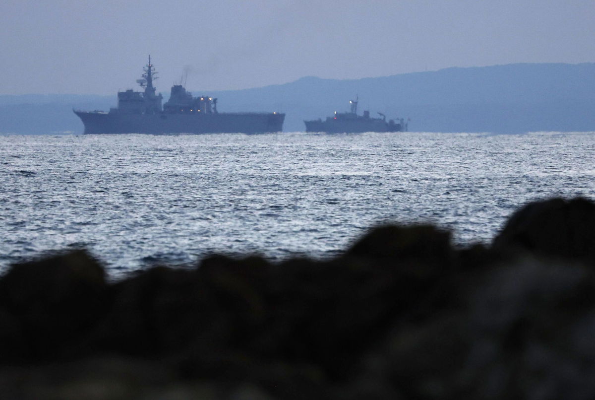 <i>Kyodo News/Getty Images</i><br/>A Japan Maritime Self-Defense Force vessel conducts a search on December 4