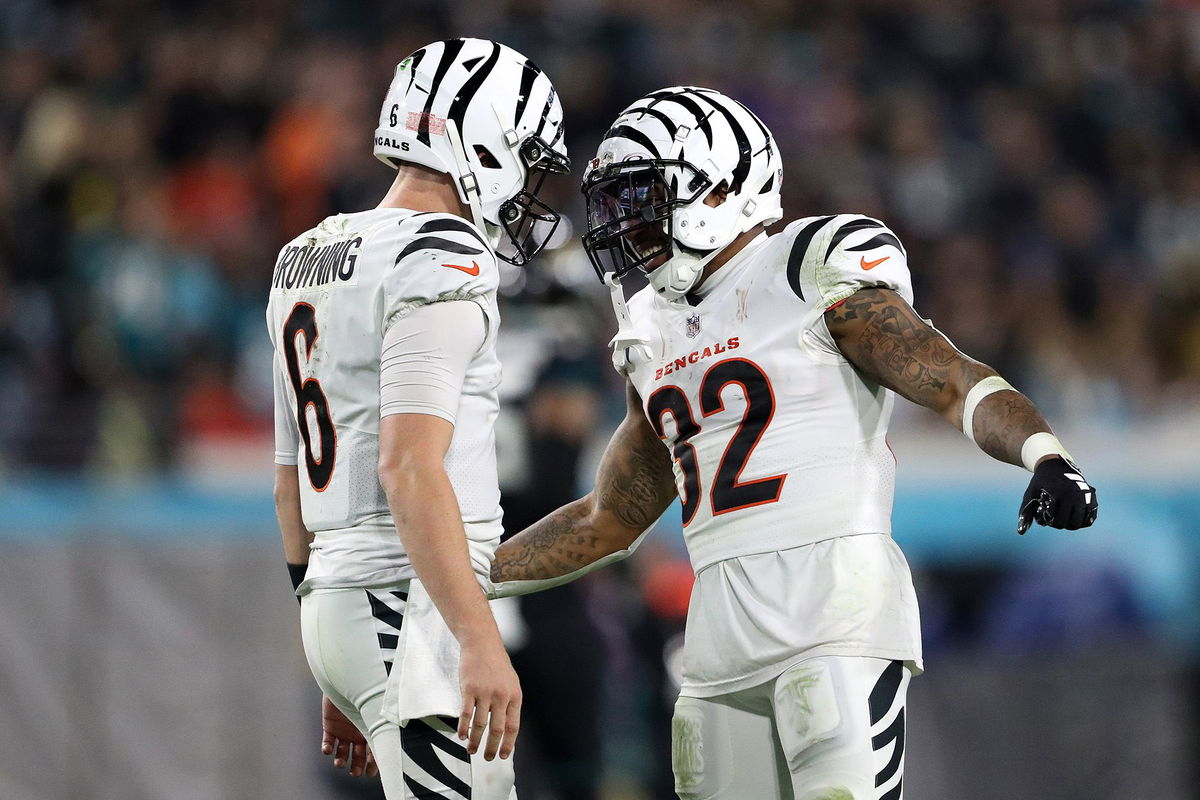 <i>Courtney Culbreath/Getty Images</i><br/>Jake Browning and Trayveon Williams celebrate a Cincinnati Bengals touchdown against the Jacksonville Jaguars during the third quarter at EverBank Stadium.