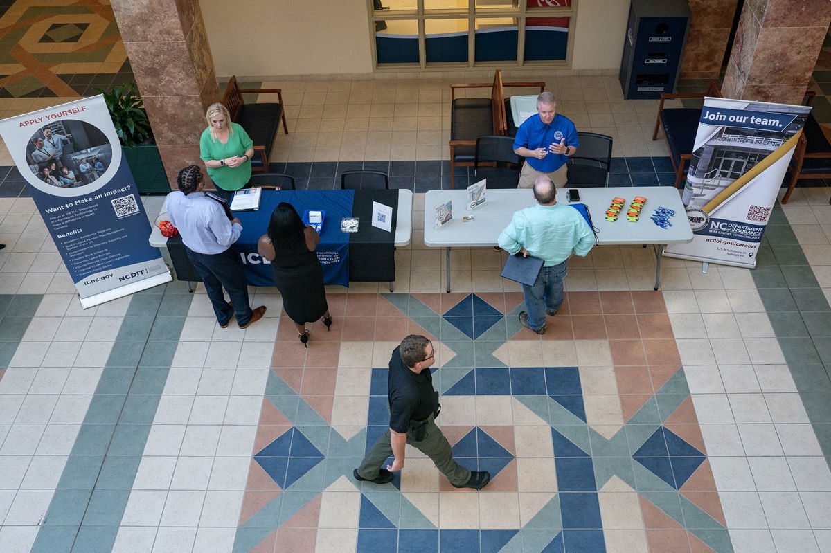 <i>Allison Joyce/Bloomberg/Getty Images</i><br/>Jobseekers attend the Cape Fear Community College's Business and IT Career Fair at Cape Fear Community College in Castle Hayne