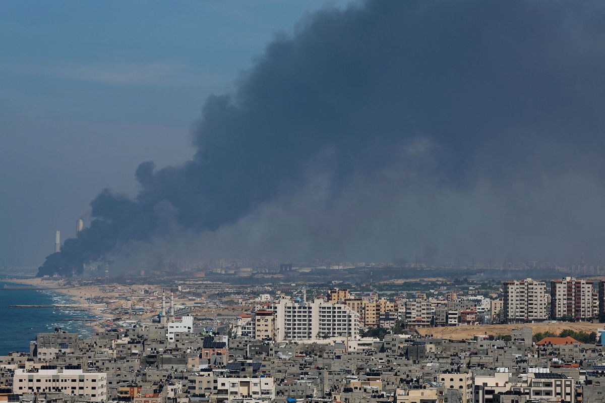 <i>Mohammed Salem/Reuters</i><br/>Smoke rises from the Israeli side after Palestinian Hamas gunmen infiltrated areas of southern Israel