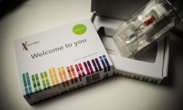 This picture shows a saliva collection kit for DNA testing displayed in Washington DC on December 19