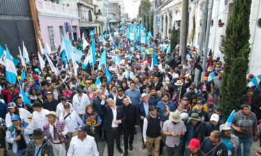 Police officers stand guard outside Guatemala's Congress building in October 2021.