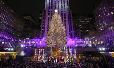 The Rockefeller Center Christmas tree is lit on Wednesday